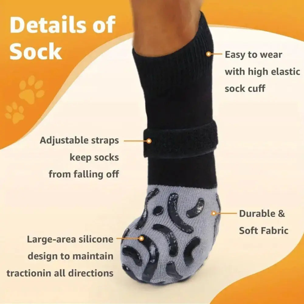 A close-up of a black anti-slip dog sock with an elastic cuff and silicone grip design.