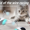 A cat is interacting with an electronic wire racing toy for pets, demonstrating its remote control function.