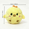 A small, yellow, plush squeaky bouncing chick ball for pets.