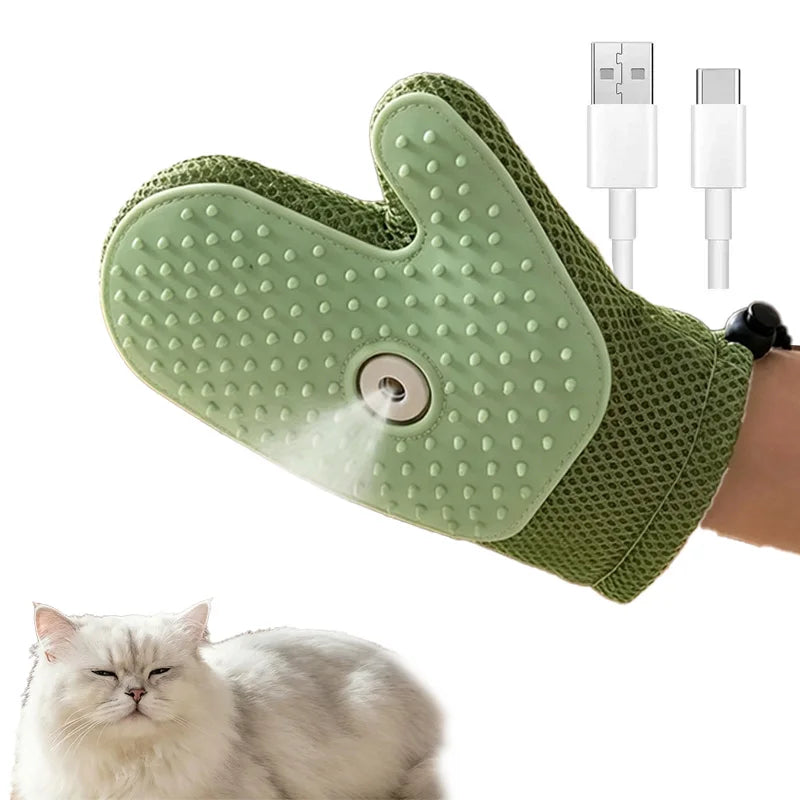 A light green electric pet grooming brush with a steam comb attachment being used on a cat.