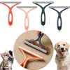 A set of silicone pet hair and lint remover tools in various colors, including orange, pink, green, and blue, shown alongside