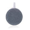 A grey air stone disc with a white nozzle for aquarium oxygenation.