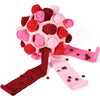 Rosa und rote Fleece-Snuffle-Spielzeug für Hunde mit Stoffriemen.