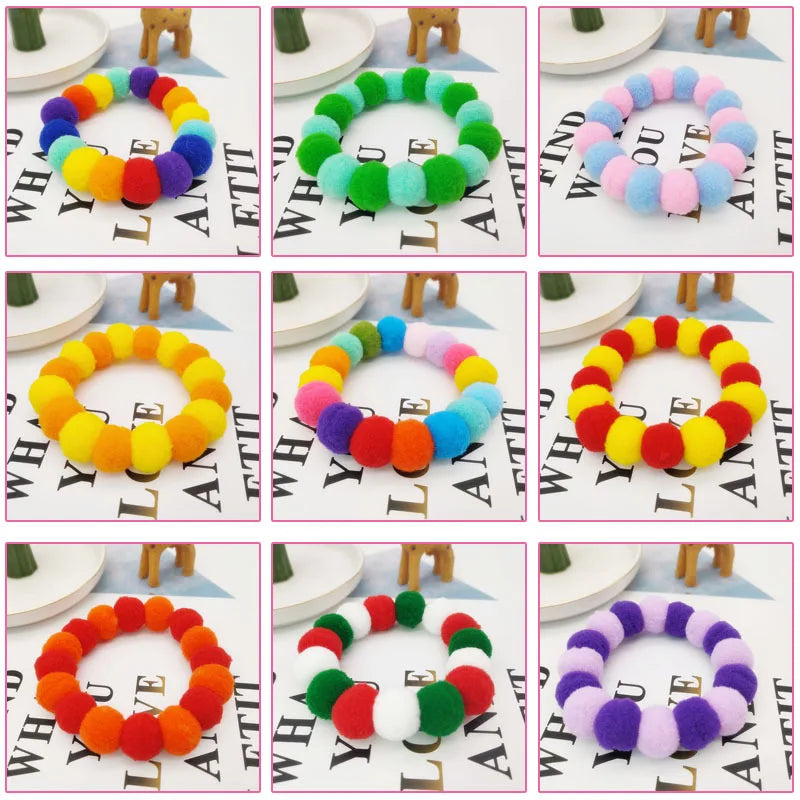A set of colorful rainbow flower pet collars and bow ties arranged in various shades and patterns.