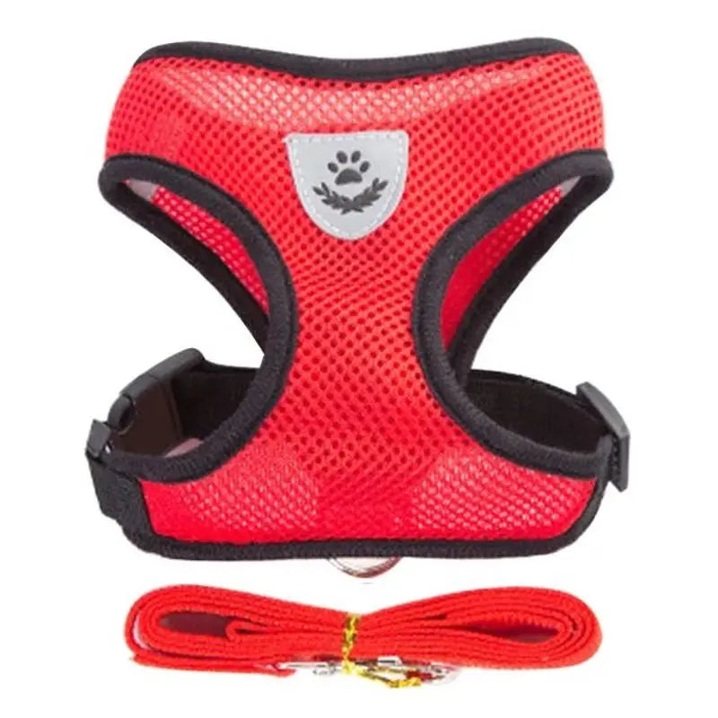 Set of red pet harness and leash with a gray paw print design