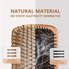 A comparison of a bamboo tooth comb and a plastic tooth comb for hair grooming tools.