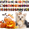 A fluffy dog wearing Halloween pumpkin print hair bows with rubber bands, surrounded by carved pumpkins.