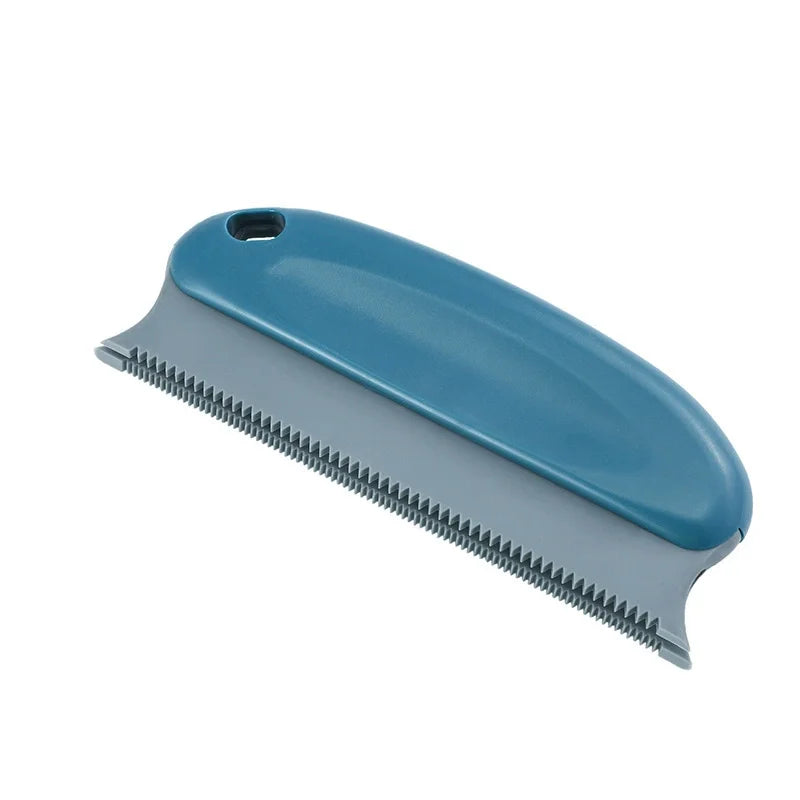 A blue and gray reusable pet hair remover brush with a serrated blade and a handle.