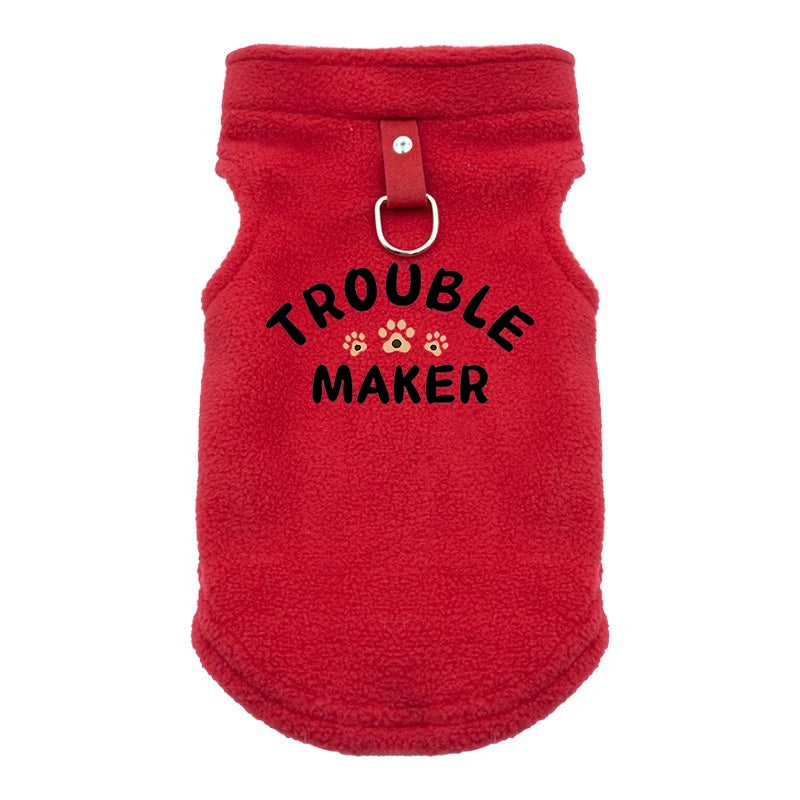 A bright red, fuzzy pet jacket for dogs with a leather-like pull tab.