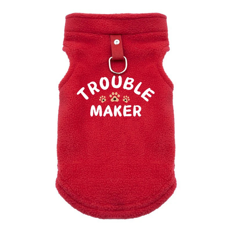 A bright red cozy winter pet jacket for dogs with a fabric collar and a metal loop.