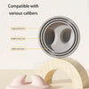 A three-ring design silicone pet can opener and feeding spoon with a sealing lid shown next to a wooden arch.