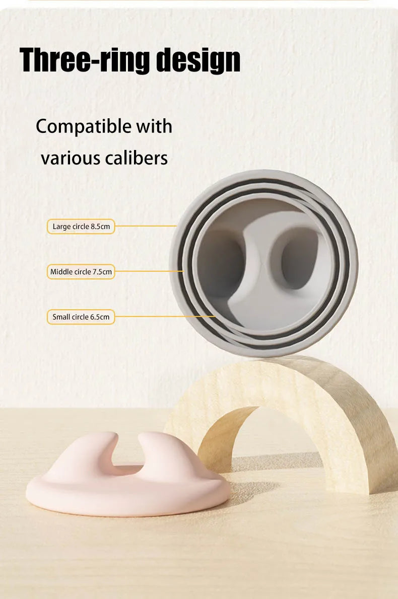 A three-ring design silicone pet can opener and feeding spoon with a sealing lid shown next to a wooden arch.