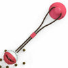 A pink suction cup chew ball with a brown cord and a serrated tip for dog dental care and play.