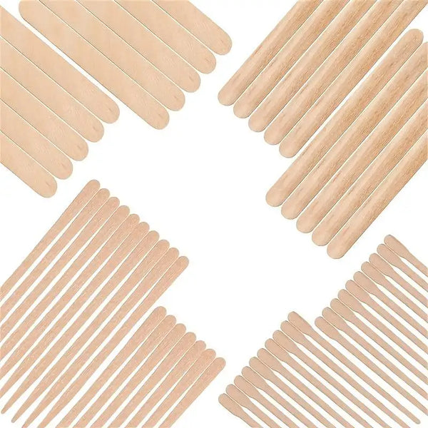 A collection of disposable wooden hair removal sticks arranged in a circular pattern.