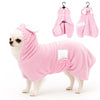 A pink hooded pet bathrobe towel for dogs and cats lying on a white background.