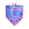 A colorful tie-dye fabric accessory with pink, blue, and purple swirls tied at the top.