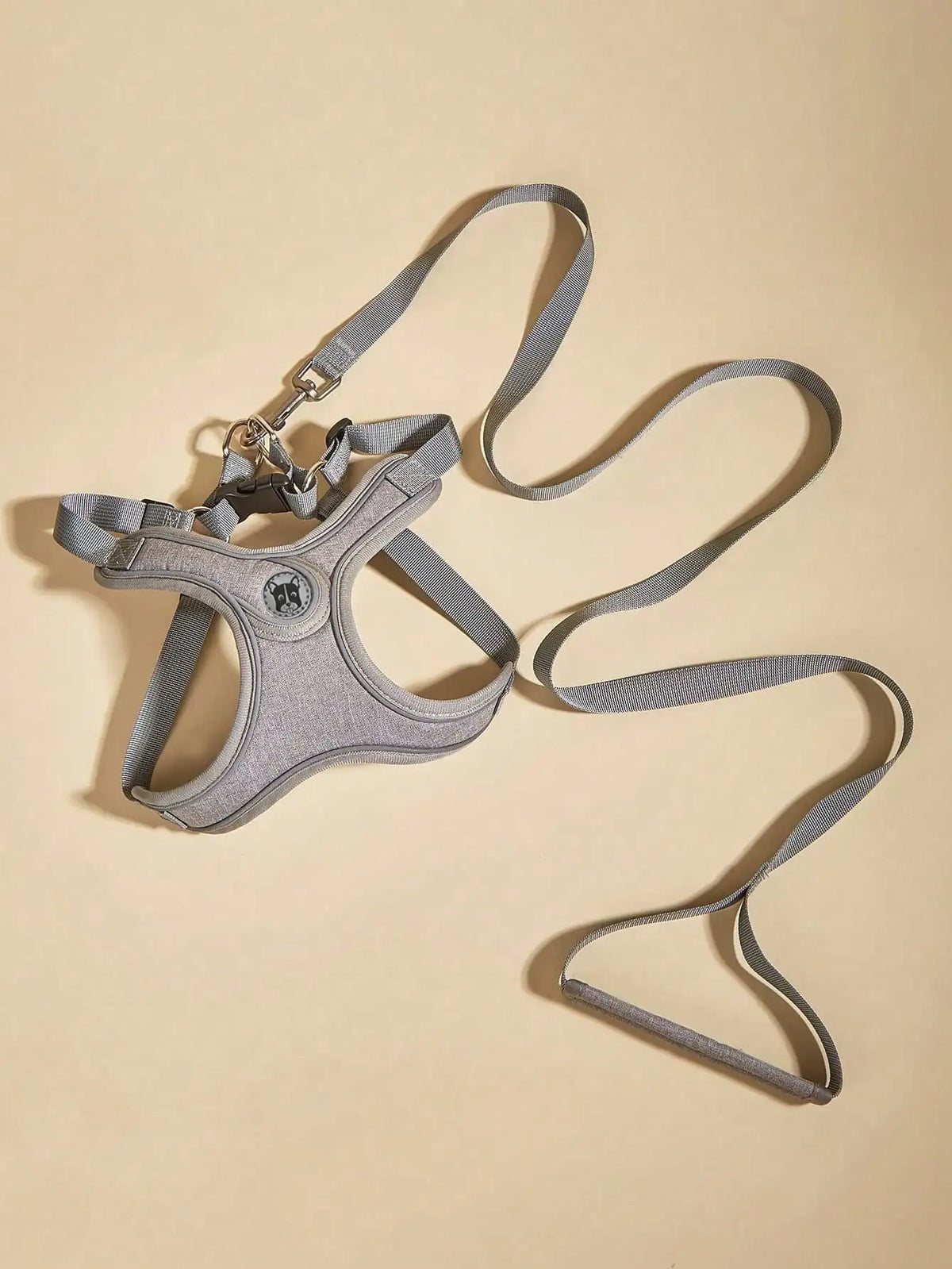 A gray comfort fit dog harness and leash set displayed against a light background.