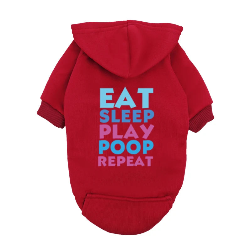 A red hoodie with white text on the back that reads Eat Sleep Play Poop Repeat