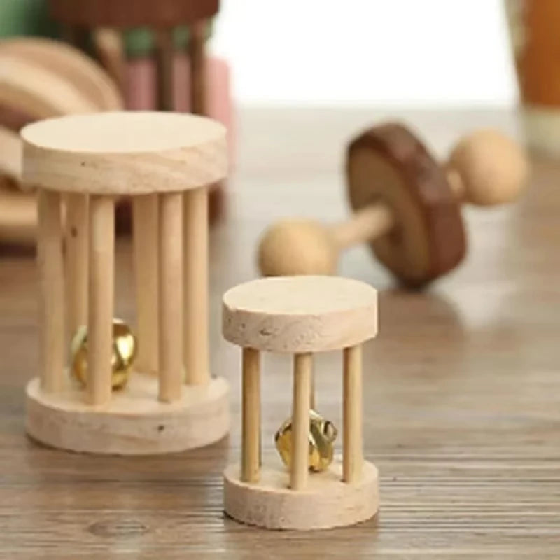 A natural wooden chew toy for small rodents featuring a cylindrical post and a ball.