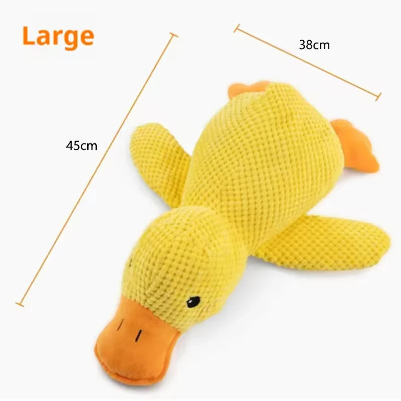 Large yellow plush duck toy with orange accents, shown from above.