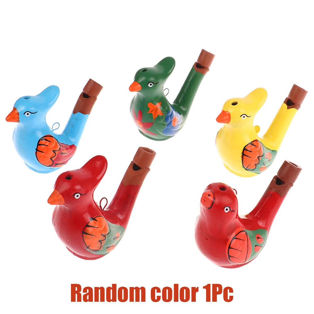Ein Set von fünf zufällig farbigen Wasservogelpfeifen für Kinder, darunter blau, grün, gelb und rot.