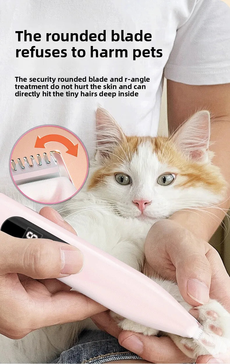 A person holds a pink electric pet hair trimmer near a cat's fur, demonstrating its use.