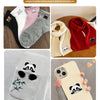 Various cat embroidered iron-on patches displayed on clothing, accessories, and phone cases.