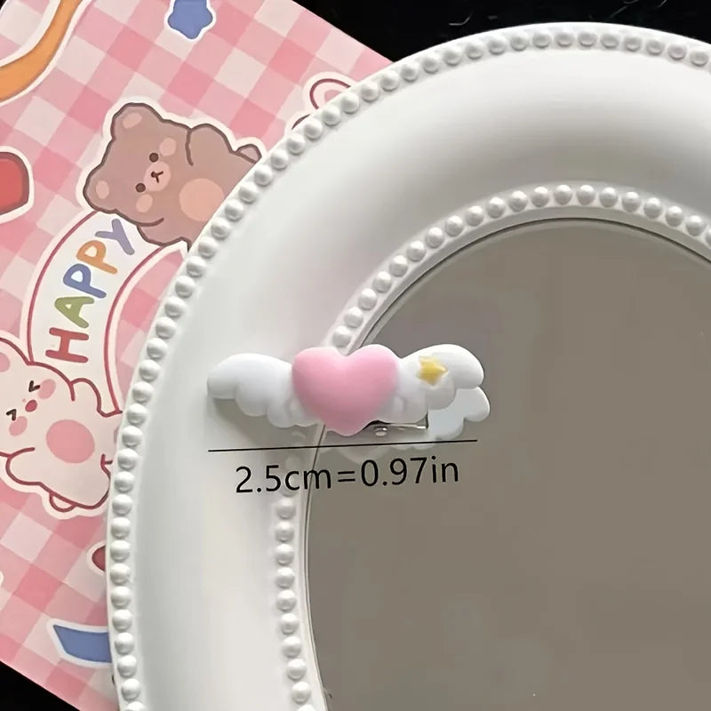 A close-up of a pink plate with a heart-shaped mini pet hair clip resting on the rim.