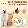 A jar of GJYC PET Shea Butter Paw Protection Cream next to a white dog and an orange cat.