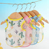 A collection of breathable summer mesh vests for small dogs and cats hanging on a clothesline.
