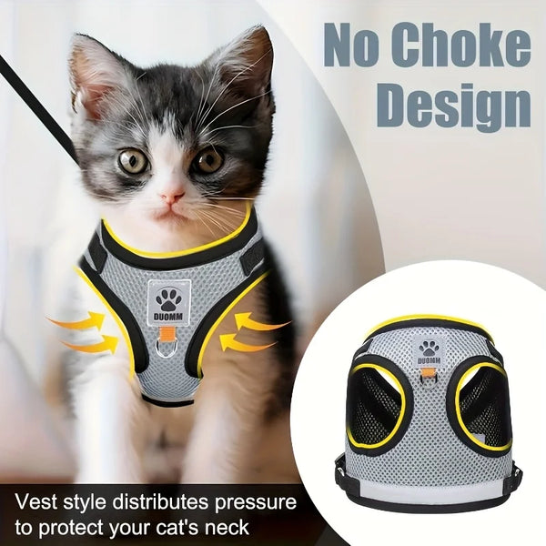 A close-up of a cat wearing a vest-style pet harness with a yellow accent, demonstrating its design for pressure distribution