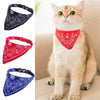 A fluffy orange cat wearing a red bandana collar, with examples of black and blue pet bandanas shown.