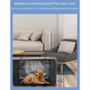 A golden dog is resting inside a black wire pet crate cover on a wooden floor.