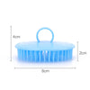 Light blue silicone hair and scalp massage brush with a handle, measuring 8cm long.