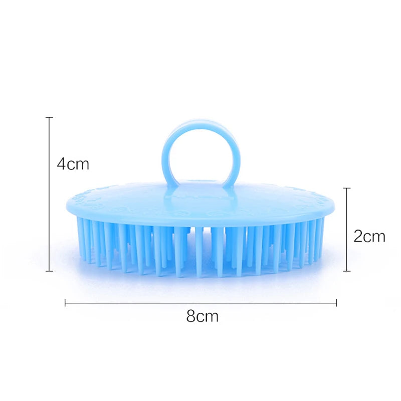 Light blue silicone hair and scalp massage brush with a handle, measuring 8cm long.