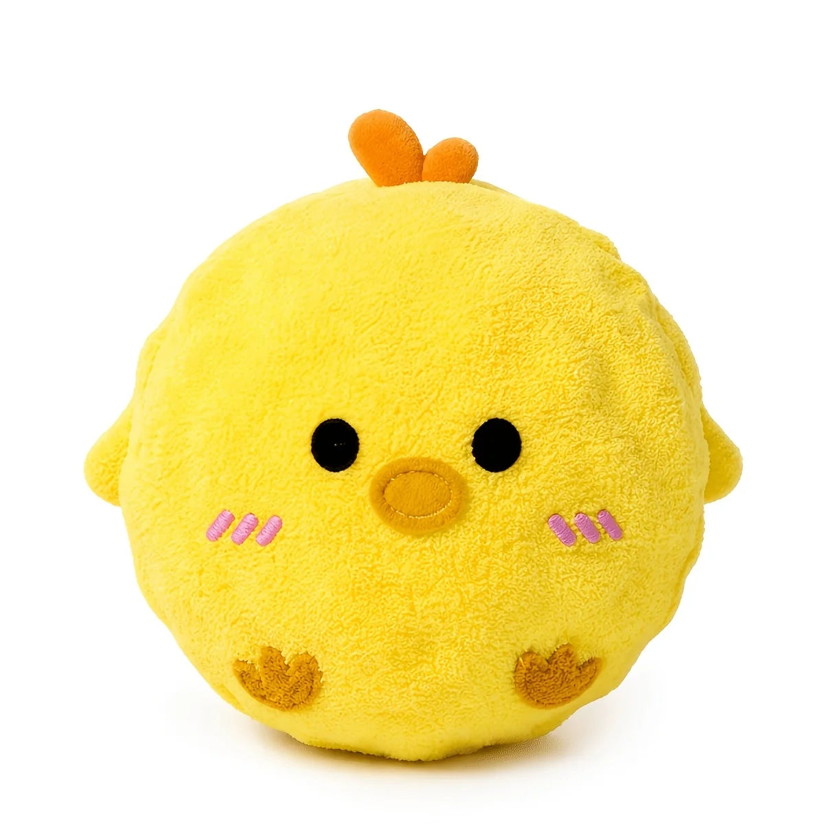 A yellow plush chick toy with orange tufts on its head.