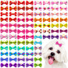 A collection of colorful pet hair bows featuring various patterns and colors tied with gentle rubber bands.