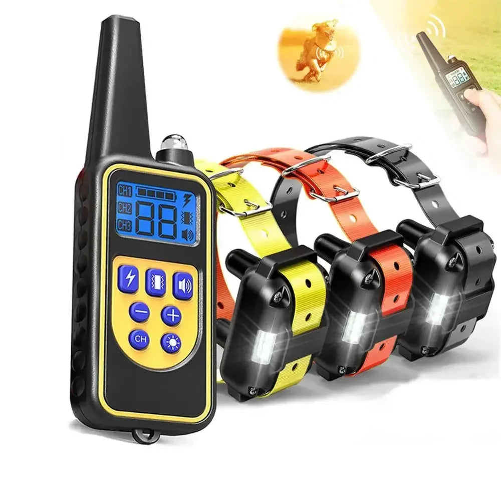 A black remote dog training collar with an LCD display and various colored training leashes is shown.