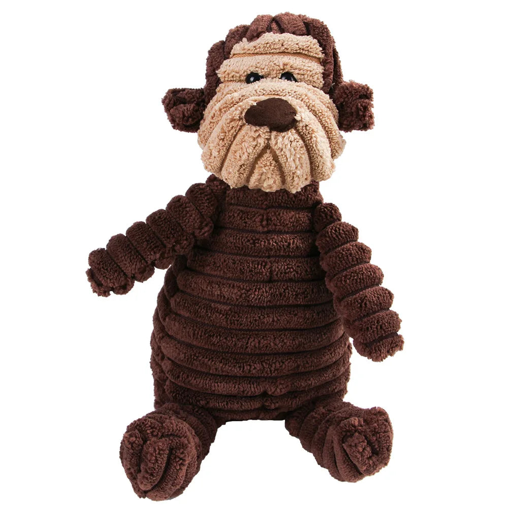 Juguete de perro marrón de peluche con barba y orejas caídas.