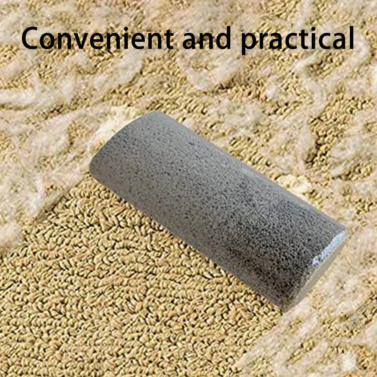 A gray pumice pet hair remover brush lying on a bed of light-colored pet hair.
