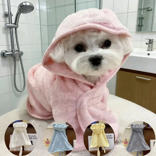 Pink quick-drying pet bathrobe for dogs and cats displayed on a white surface.