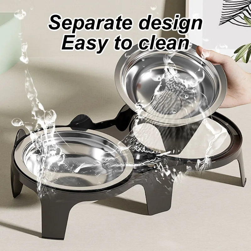 Stainless steel double pet bowl with anti-tip design being washed.