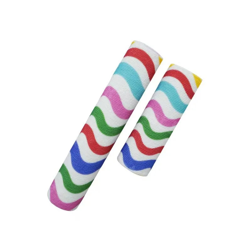 A roll of colorful striped cat scratching board material with self-adhesive backing.