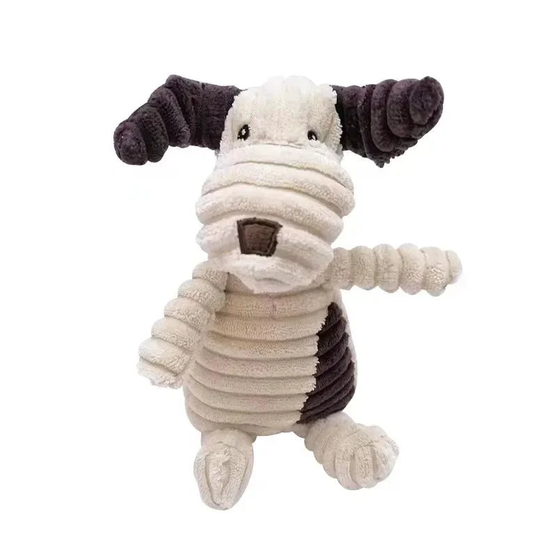 A plush dog toy with corduroy ears and body, featuring gray and white fur patterns.