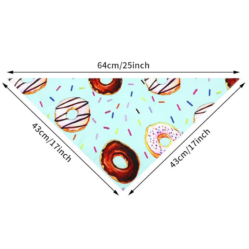 A sheet of donut print dog bandanas with various donuts and sprinkles, measuring 64cm by 43cm.