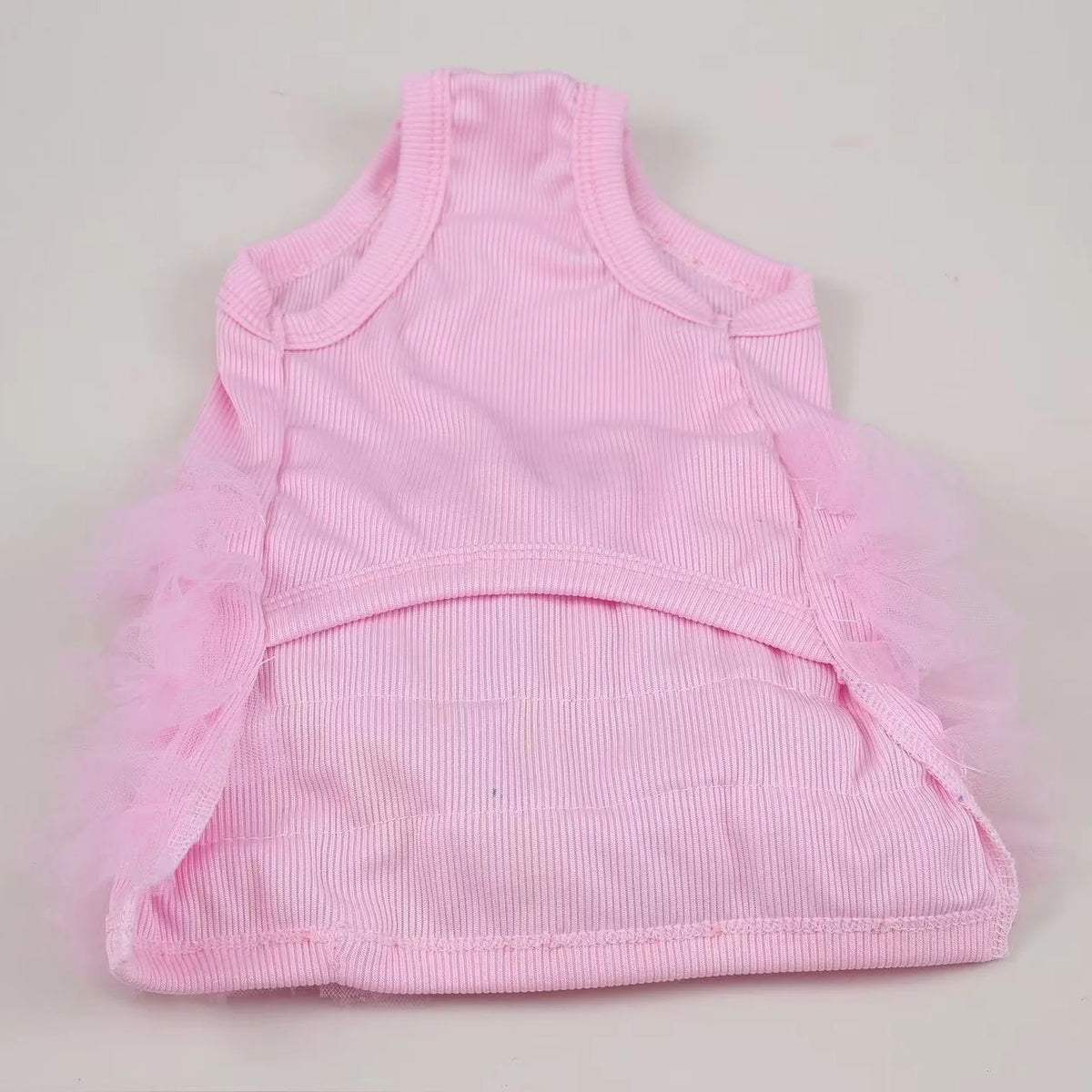 Pink knitted vest top for dogs or cats