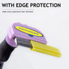 A purple pet deshedding brush with a yellow attachment is shown against a white background.