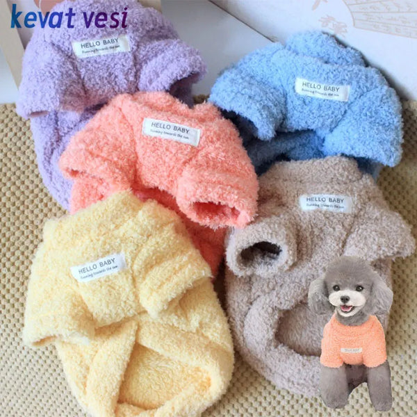 A collection of warm plush winter dog sweaters in various pastel colors including purple, orange, and blue.