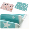 Reusable absorbent pee pad for small pet cages featuring a teal and white star pattern.