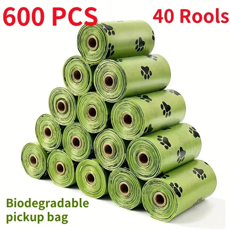A stack of 40 rolls of biodegradable poop bags in light green packaging.